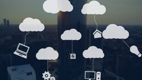 animation of application icons hanging with clouds over aerial view of skyscraper at sunset