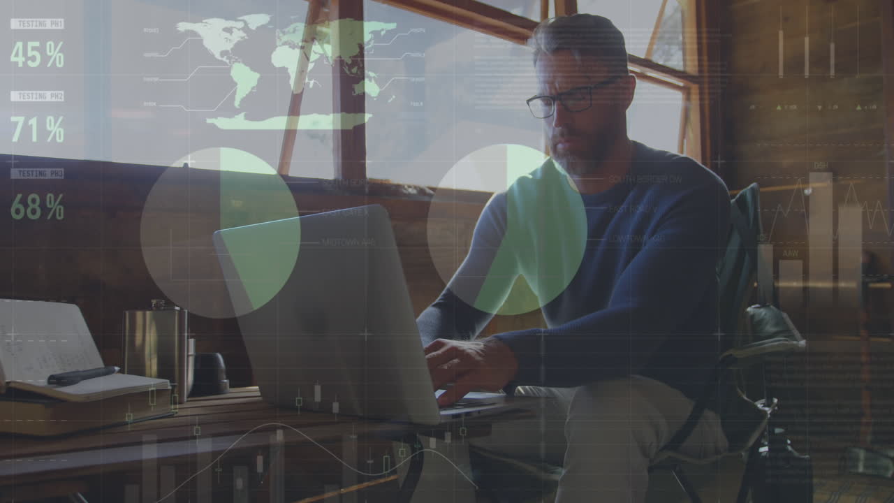 Animation of statistical data processing against thoughtful caucasian man using laptop at home