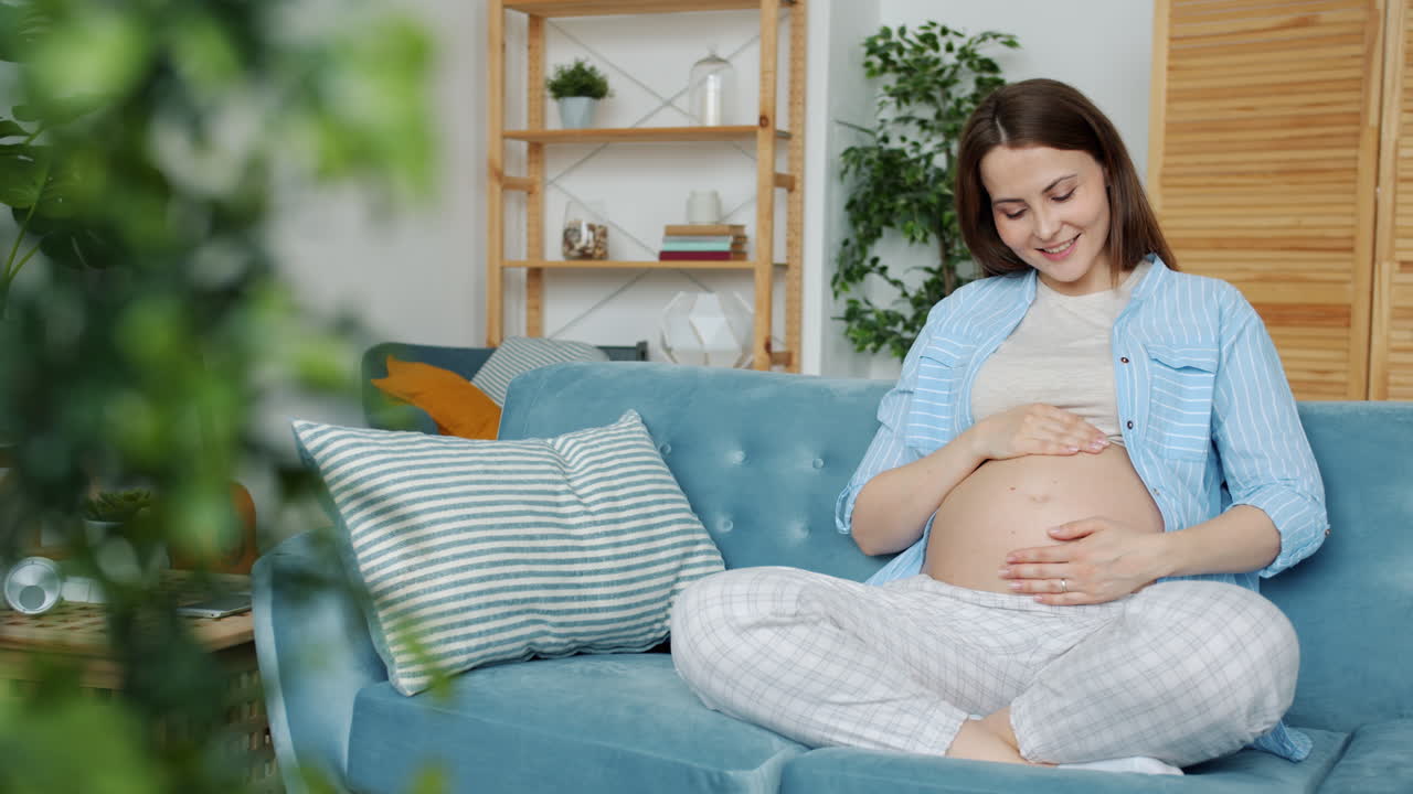 Pregnant Woman Relaxing at Home