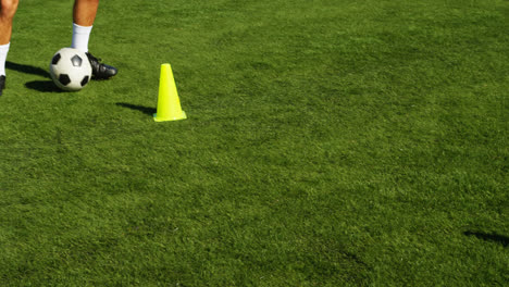 football player practicing in the field 4k