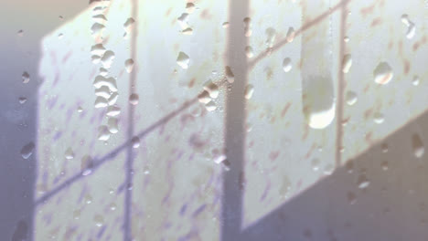 animación de gotas de lluvia sobre la sombra de la ventana sobre un fondo gris