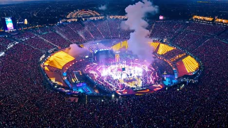 aerial view of a large concert in a stadium at night