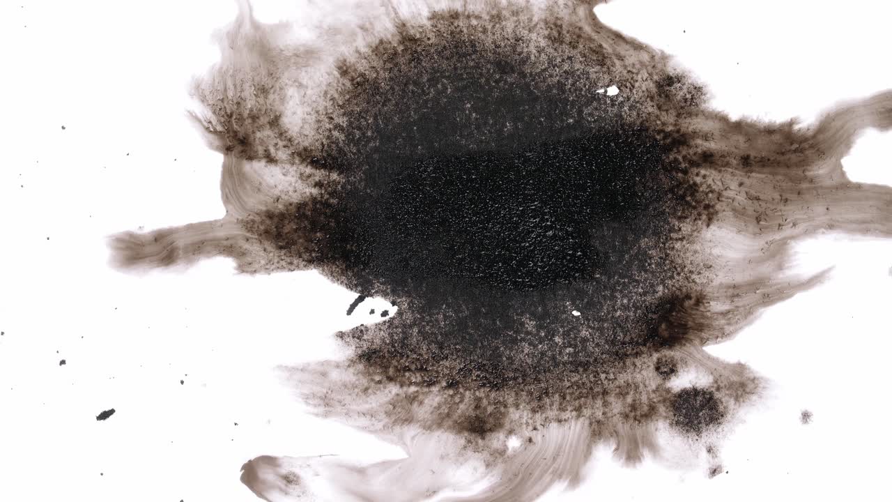 Black Ink Drops On White Background