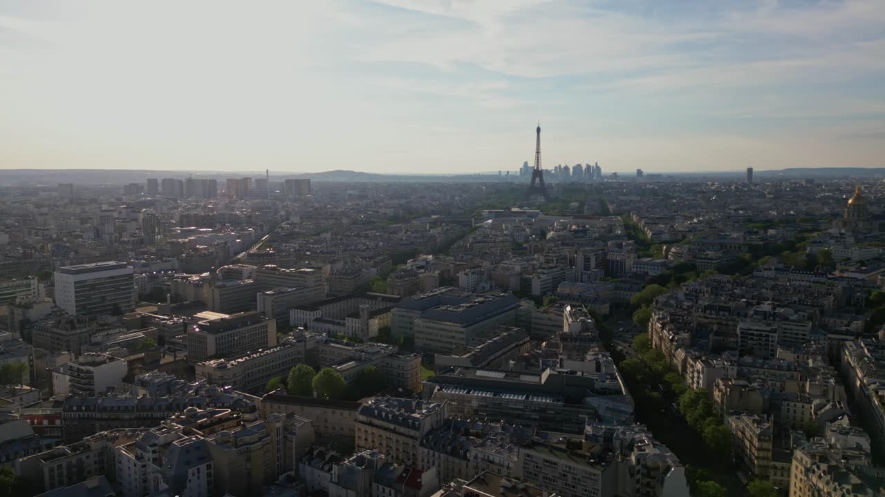Paris cityscape with Tour Eiffel and La Defense skyscrapers in background, France