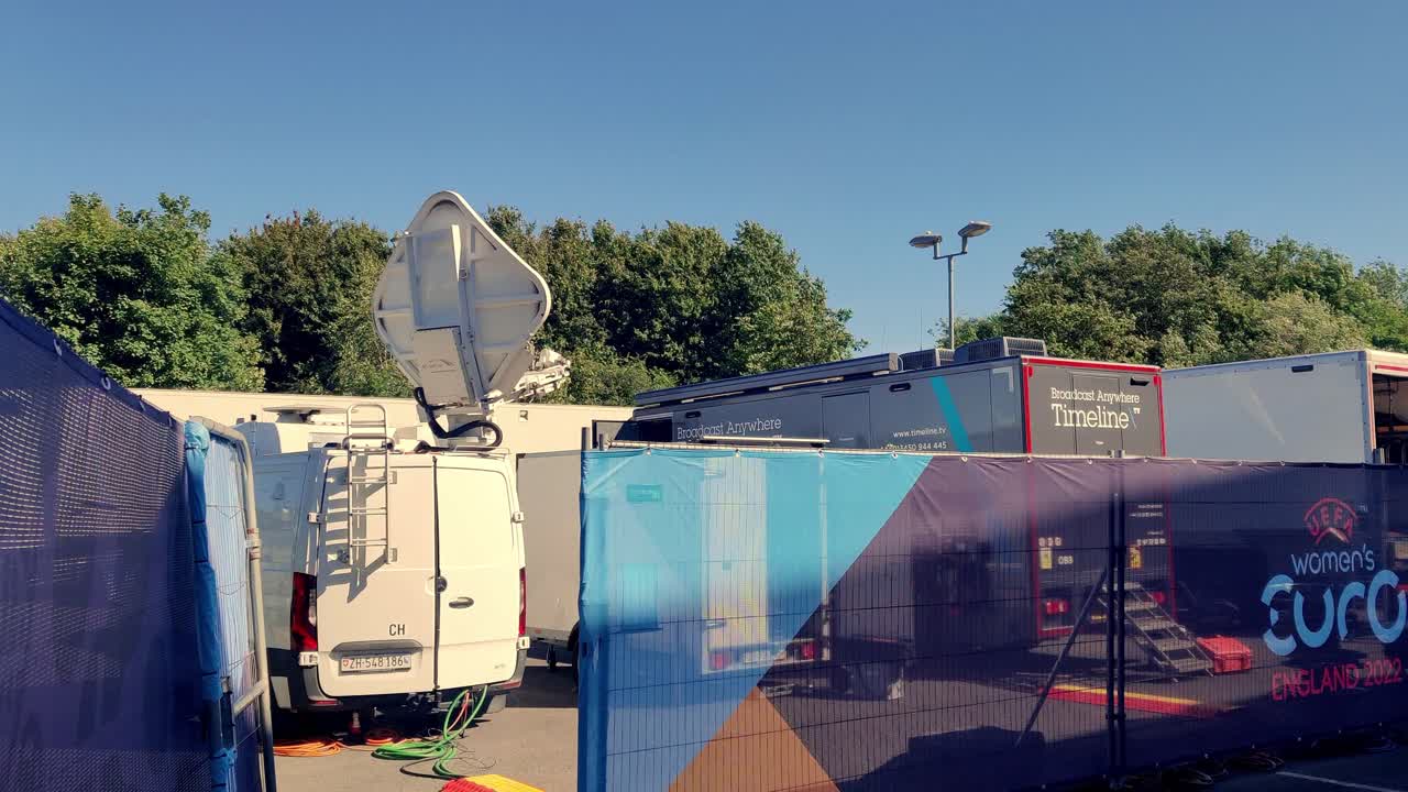 UEFA womans euro 2022 TV broadcast vans with satallite dishes