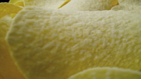 Macro-video-of-potato-chips-spinning-in-a-bowl