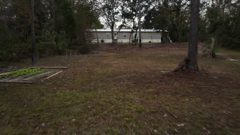 aerial view of double wide home in alabama wooded area