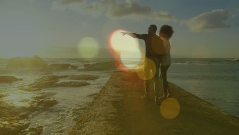 animación de puntos de luz sobre una pareja afroamericana caminando y tomados de la mano