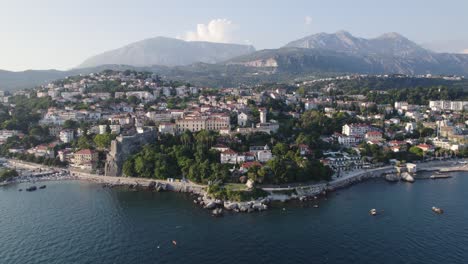 panorama of coastal town herceg novi in bay of kotor, montenegro, mountain range orjen