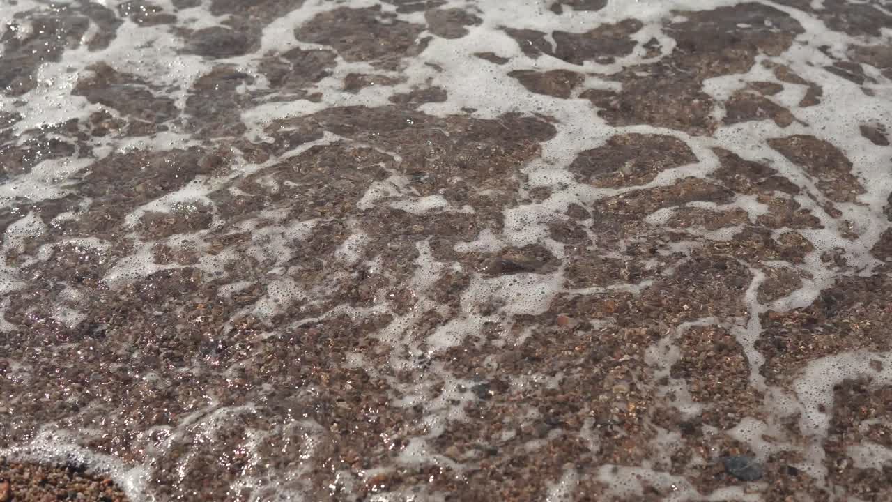 모래 해변 의 파도 들 의 클로즈업