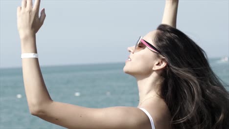 woman enjoying a day by the ocean