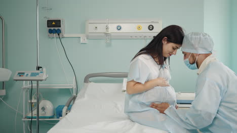pregnant woman receiving care in a hospital