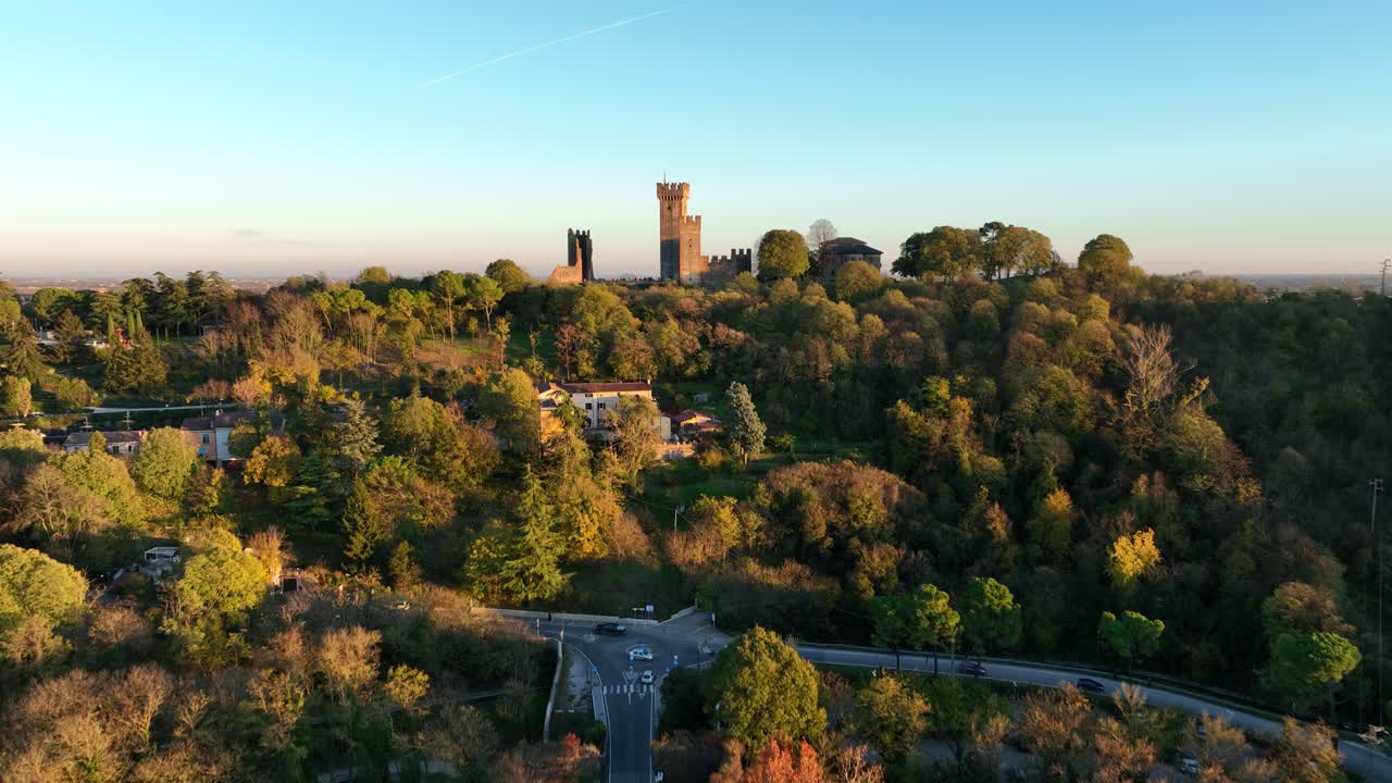 Aerial Forward Drone shot of Valeggio's Castle over Visconteo's Bridge at Golden Hour