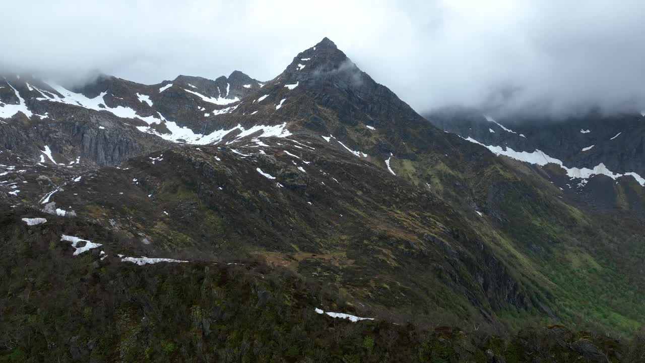 Stortinden and Breitinden near Svolvaer in spring, fog on peaks and late snow by Hopspollen