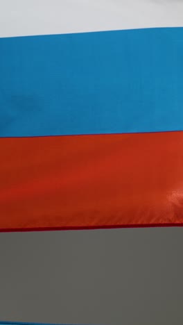 Vertical-Pedestal-Shot-of-Ukrainian-and-Russian-Flags-01