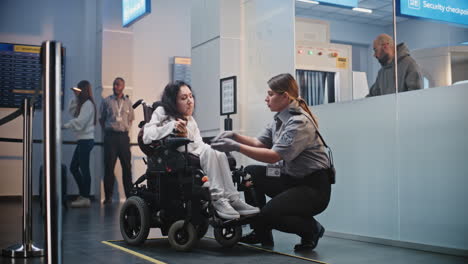 airport security assisting disabled passenger