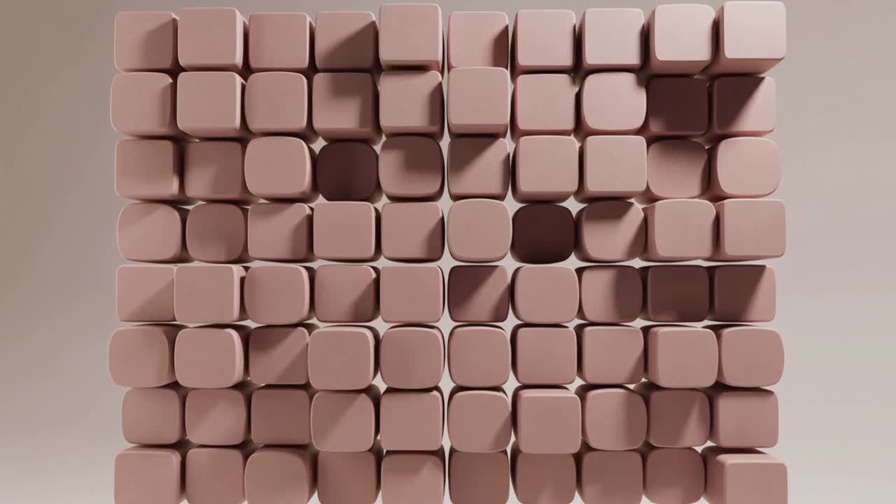 Animation starting, square matrix pale-pink rounded cubes forming deepening concave pockets on base