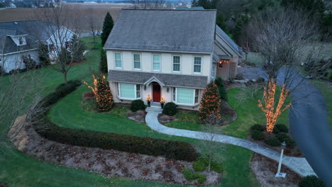 single family home decorated with pretty christmas lights