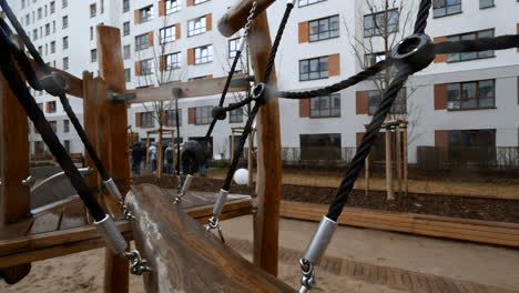 modern wooden playground in urban apartment complex