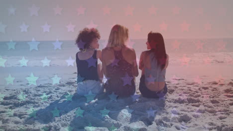 multiple blinking stars against group of friends walking together on the beach