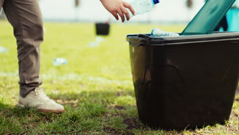 people, hands and recycling plastic bottle