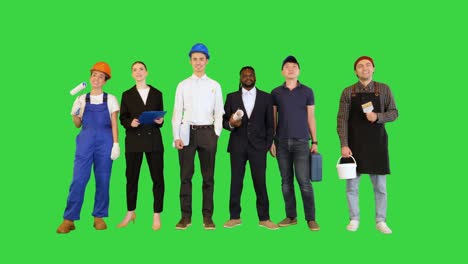 business, delivery service and people concept - happy international office and manual workers on a green screen, chroma key