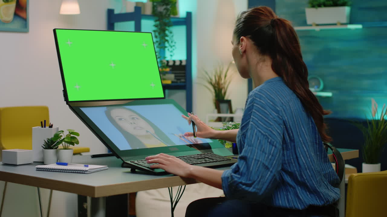 Editor retouching pictures and having green screen