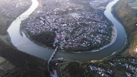 beautiful panoramic view from the drone to the river around the town