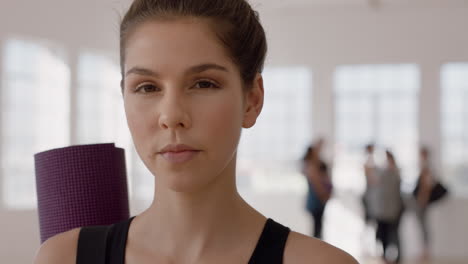 portrait beautiful caucasian woman smiling enjoying yoga class practicing healthy lifestyle in fitness studio