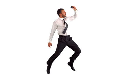 businessman jumping and taking self portrait