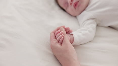 Bed,-holding-hands-or-mother-with-infant