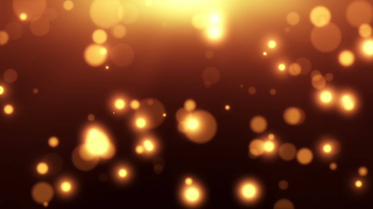 Partículas Bokeh Douradas Flutuando em Fundo Escuro e Quente
