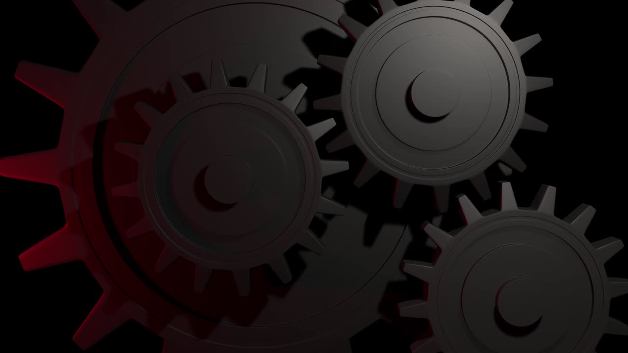Slowly rotating dark metallic gears or cogs. Blinking red light flash reflecting off the cogs. Machinery background.