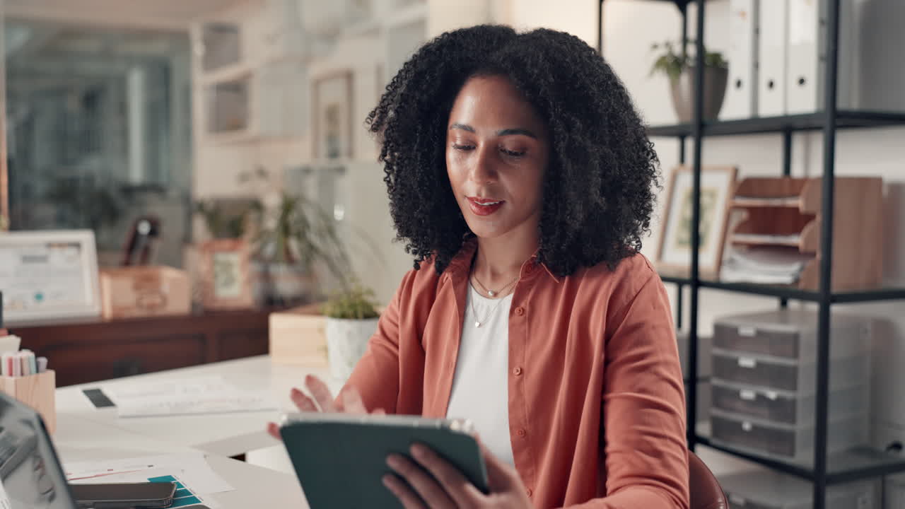Businesswoman working with tablet in office