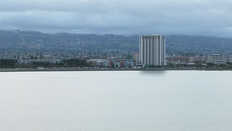 aerial footage of the emeryville shore and cars along interstate 580.