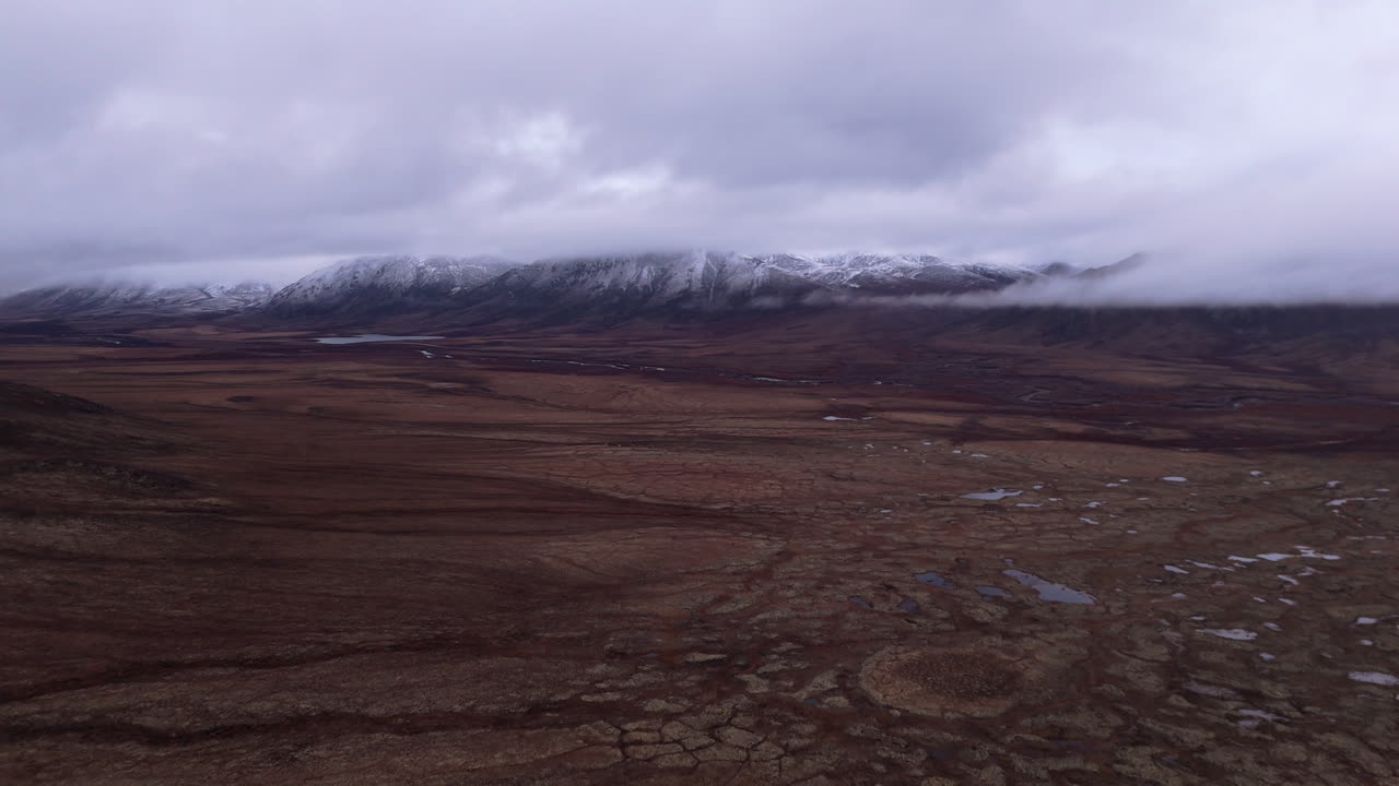 Snowy Mountains Of Ogilvie In Dempster Highway, Yukon, Canada - Drone Shot