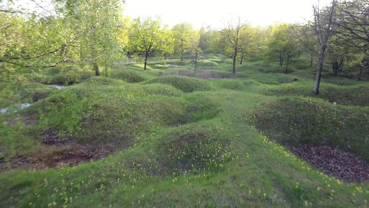 Free stock video - Old ww1 shell holes covered with grass and full of ...