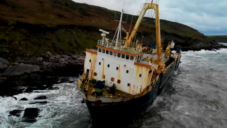 shipwreck in a bay,
abandoned ghost ship