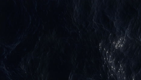 aerial view of the dark ocean. ripples and waves on deep water surface