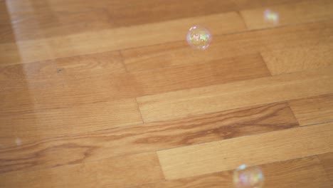 bubbles coming out of wooden floor