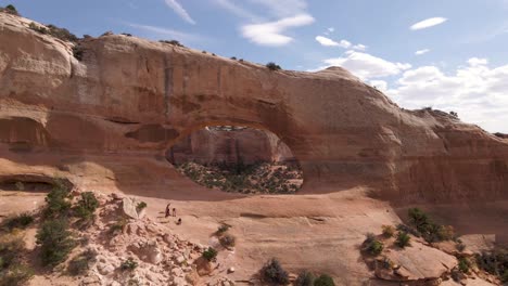 picturesque view of wilson arch in moab, utah - tourist attraction in the usa - panning shot