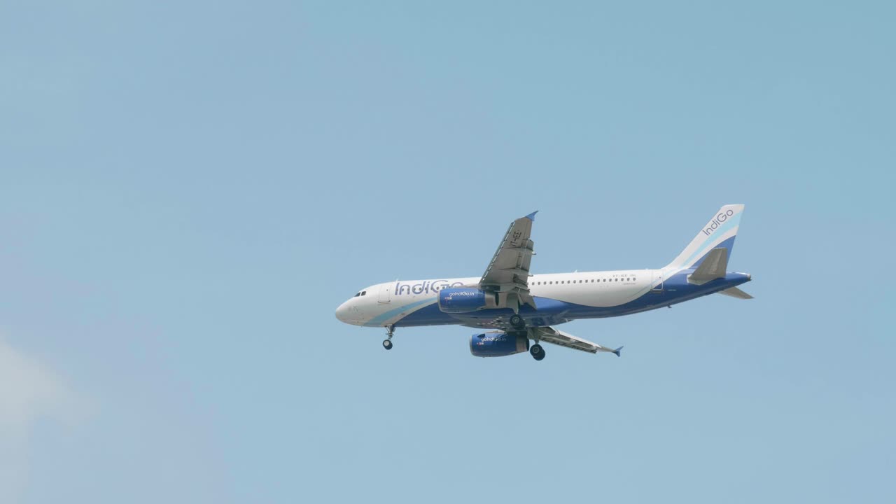 IndiGo Airbus A320-232 VT-IEE approaching before landing to Suvarnabhumi airport in Bangkok at Thailand. 4K Slow Motion from 59.94 fps to 29.97 fps