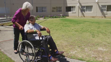 Senior-couple-enjoying-the-park-of-a-retirement-home