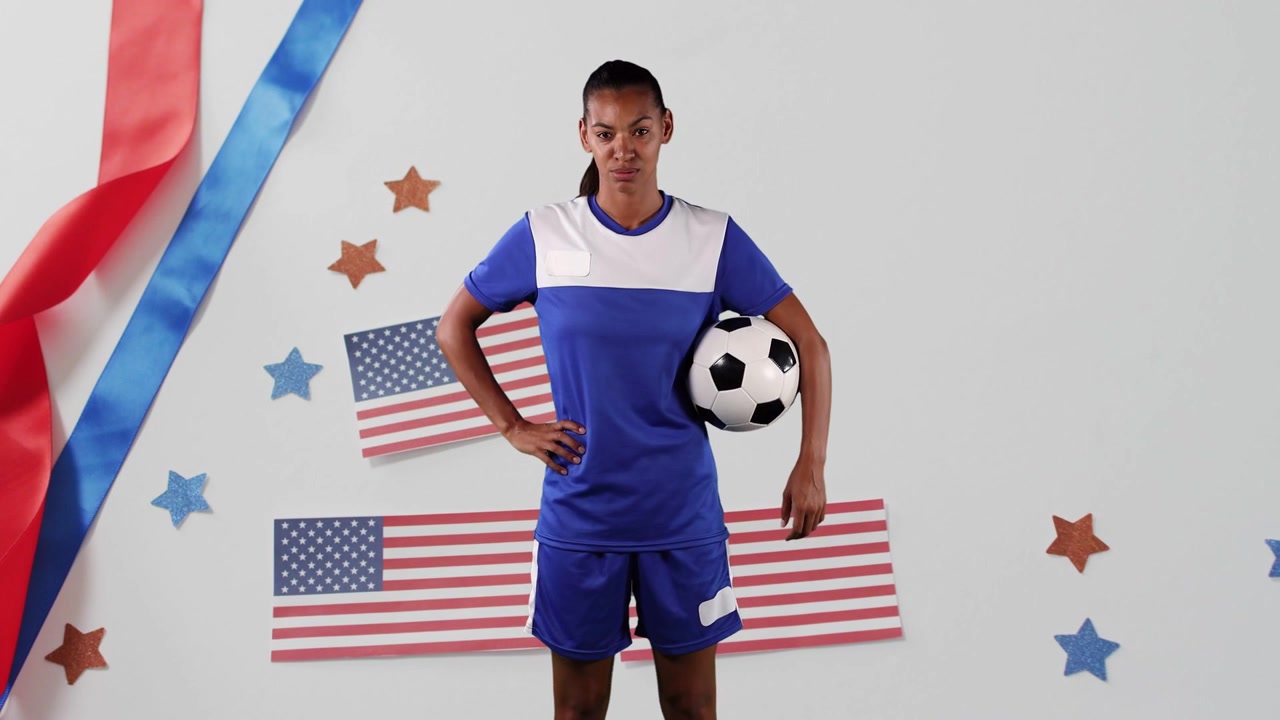 Camera rolling woman soccer player posing holding ball stars floating around her selling sports kit