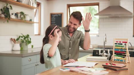 High-five,-kitchen-and-father-doing-homework