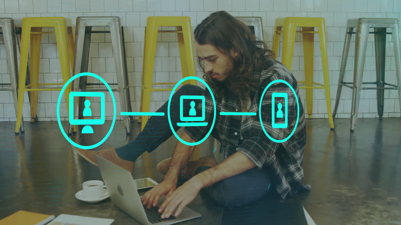 animación de iconos de los medios sobre el hombre caucásico usando portátil