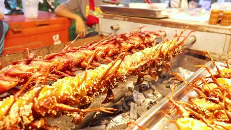 street vendor grilling quail skewers in bangkok, thailand. vibrant colors and lively atmosphere captured in 13-second video