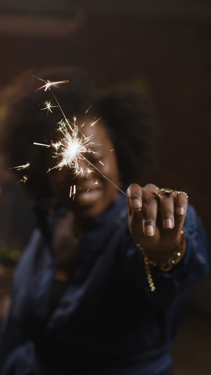 Woman celebrating with a sparkler