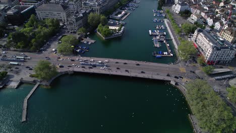 historic quay bridge with busy traffic in zurich, switzerland