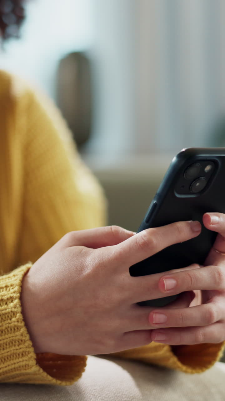 Person's Hands Scrolling and Typing on a Smartphone